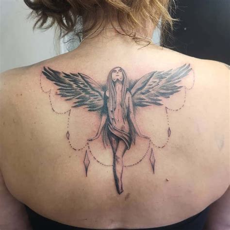 angel with wing tattoo|feminine angel wing tattoos.